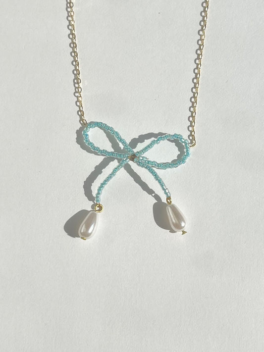 Hera Bow Necklace (tropical blue)